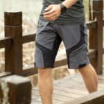 "Men’s quick-drying outdoor cycling shorts breathable double-layer design" "Black men’s cycling shorts with sponge cushion padding" "Summer mountaineering sports shorts for men" "Nylon spandex breathable fabric outdoor trousers" "Men’s shock-absorbing cycling shorts for outdoor sports"