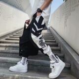 Black hip-hop trousers for men with tapered small-feet design