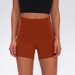 Women’s high-waist hip-lifting sports shorts in black Nylon quick-dry yoga shorts for women – blue color Women’s breathable fitness shorts – green Red hip-lifting workout shorts for women Grey tight sports shorts for yoga and dance Women’s super elastic gym shorts front view High-waist fitness shorts S–XL size range
